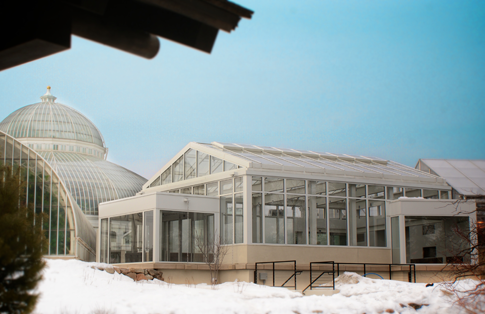 New pavilion with historic conservatory in background